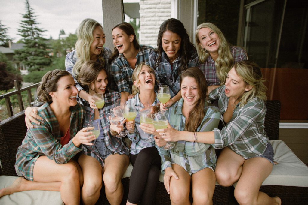 Bridal party toasting to champagne. This is a great wedding advice and tip to do on the wedding day. 